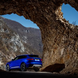 2017-Jaguar-F-Pace-First-Edition-rear-side-view-rocky-formation.jpg